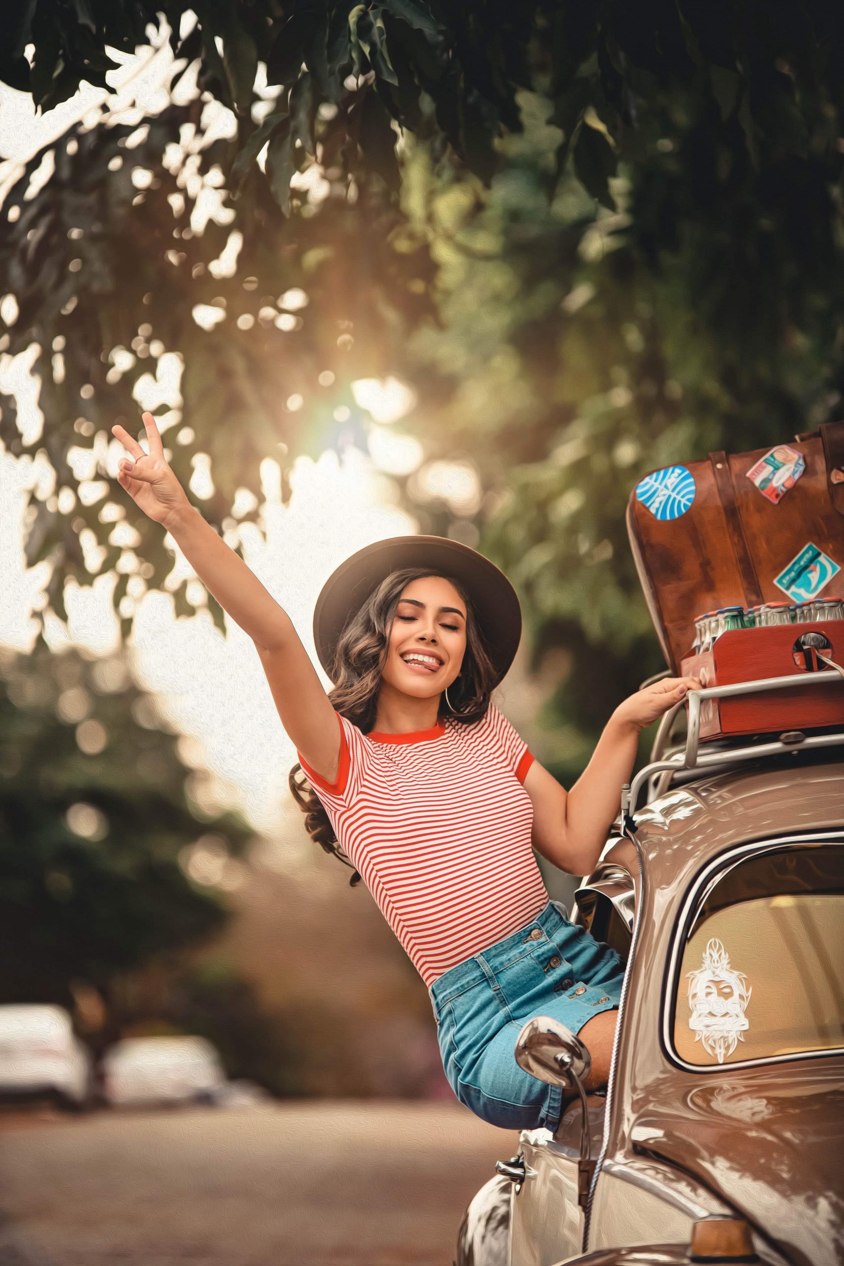 woman-smiling-sitting-on-car-window-2952775